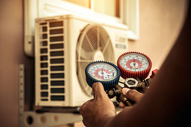 Professional Ductwork Repair technician working in Harlan, KY